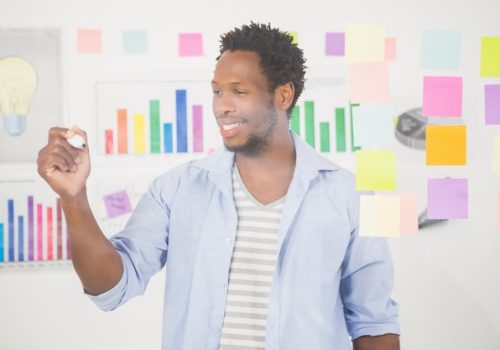 casual-businessman-looking-post-it_13339-158289